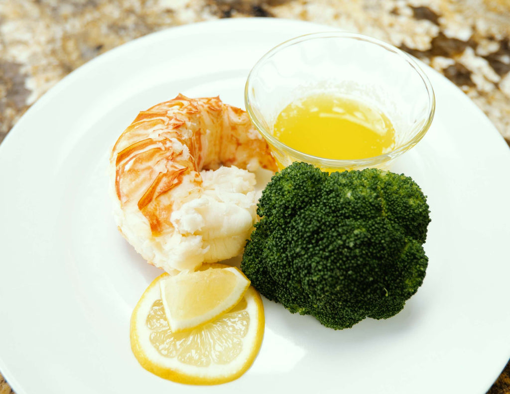 Sealand warm water lobster tail with dip and broccoli 