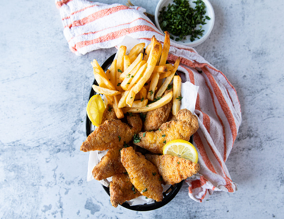 Basket of Sealand's Breaded Chicken Fingers and Fries