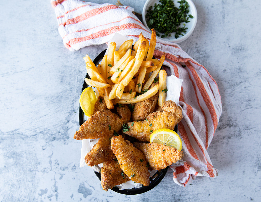 Basket of Sealand's Breaded Chicken Fingers and Fries