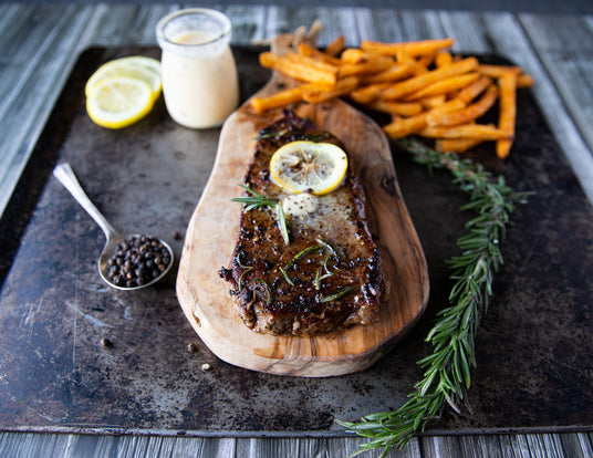 Sealand Quality Foods 8oz New York Striploin Steak with Butter, Herbs, and Lemon