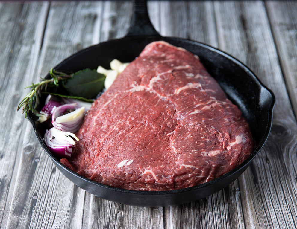 Sealand Quality Foods Raw Premium Top Sirloin Roast in a Cast Iron Pan
