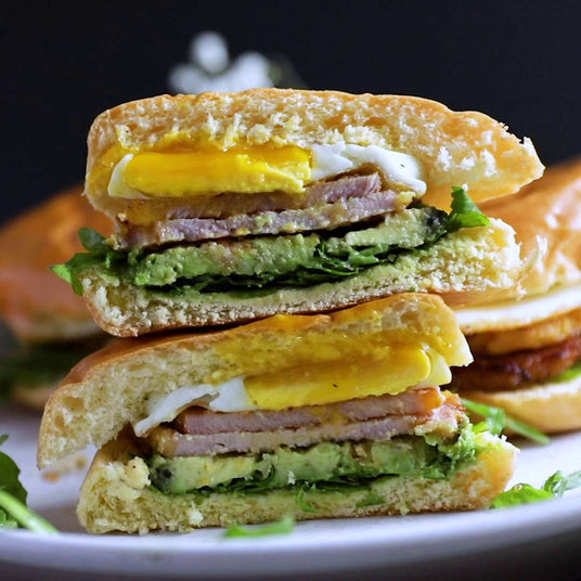 Sealand peameal bacon breakfast sandwiches with avocado and arugula