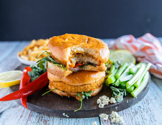 Sealand Quality Foods spicy buffalo chicken breast burgers with bleu cheese, arugula and French fries