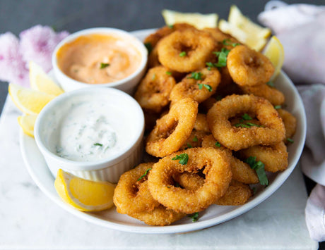 Sealand breaded calamari rings with homemade tartar sauce and chipotle sauce