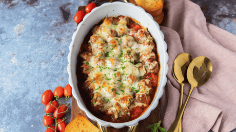 A delicious Cheesy Meatball Casserole prepared in a dish