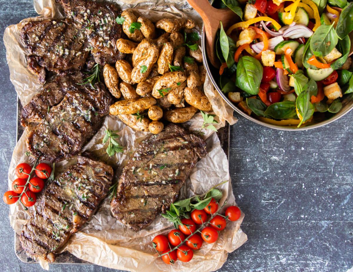 Ribeye Steaks On The Grill With Rosemary Butter, Panzanella Salad & Potatoes