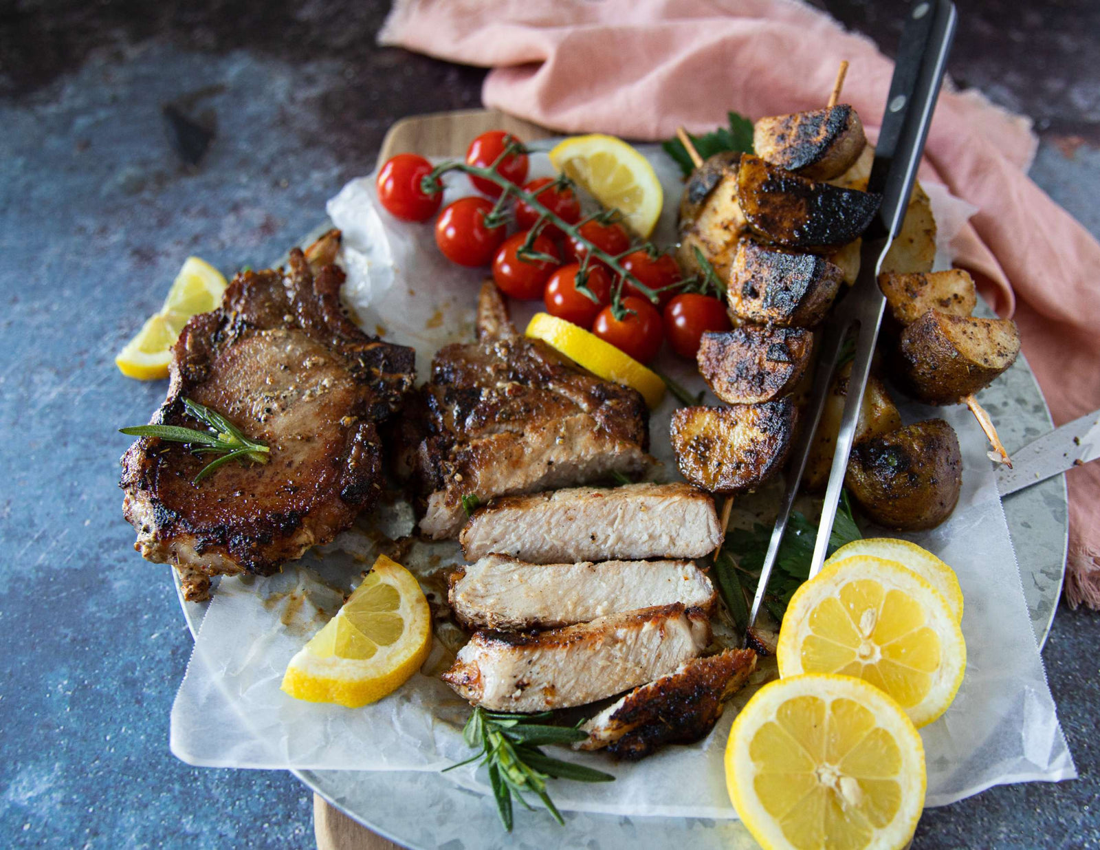 Sealand French cut pork chops served with roasted potatoes and fresh garnish