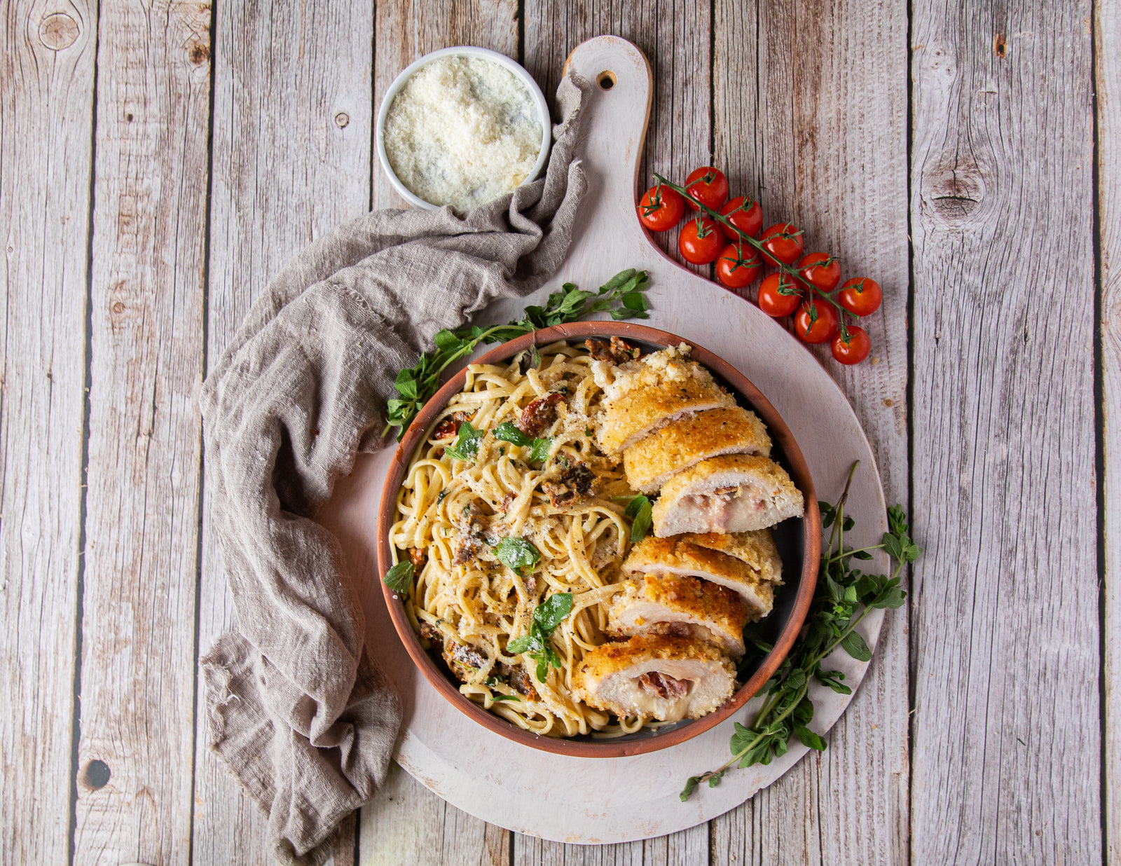 Sealand chicken cordon bleu with creamy sundried tomato pasta in serving bowl 