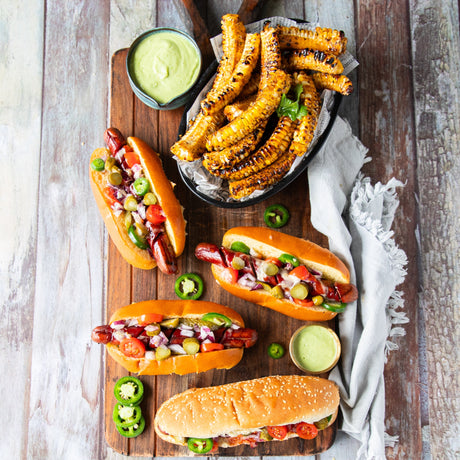 Grilled Hot Dogs with Seasoned Corn Ribs and Avocado Crema
