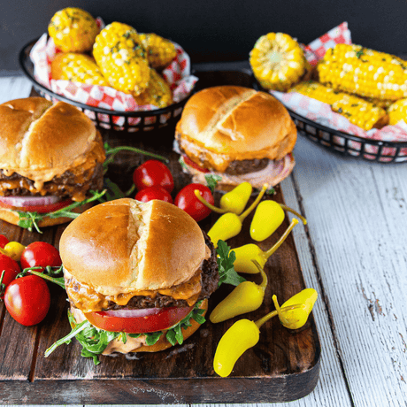 Grilled Prime Rib Burgers with Herb Butter Corn on the Cob