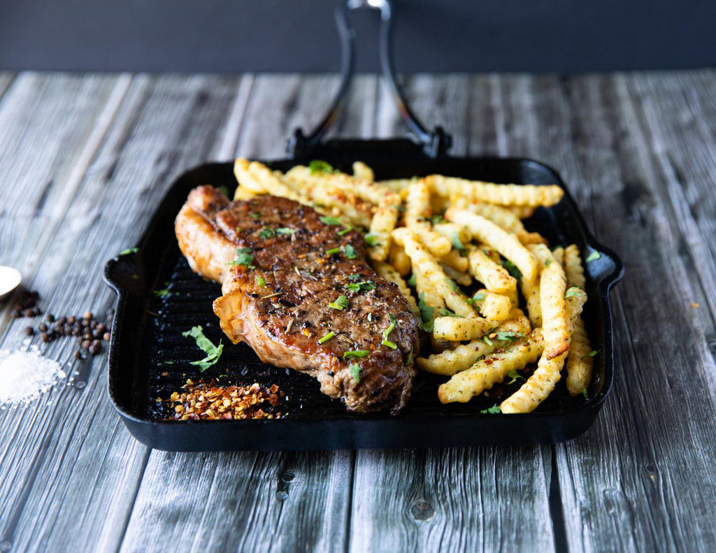 12oz Sealand New York Striploin in a Grill Pan with Crinkle Fries