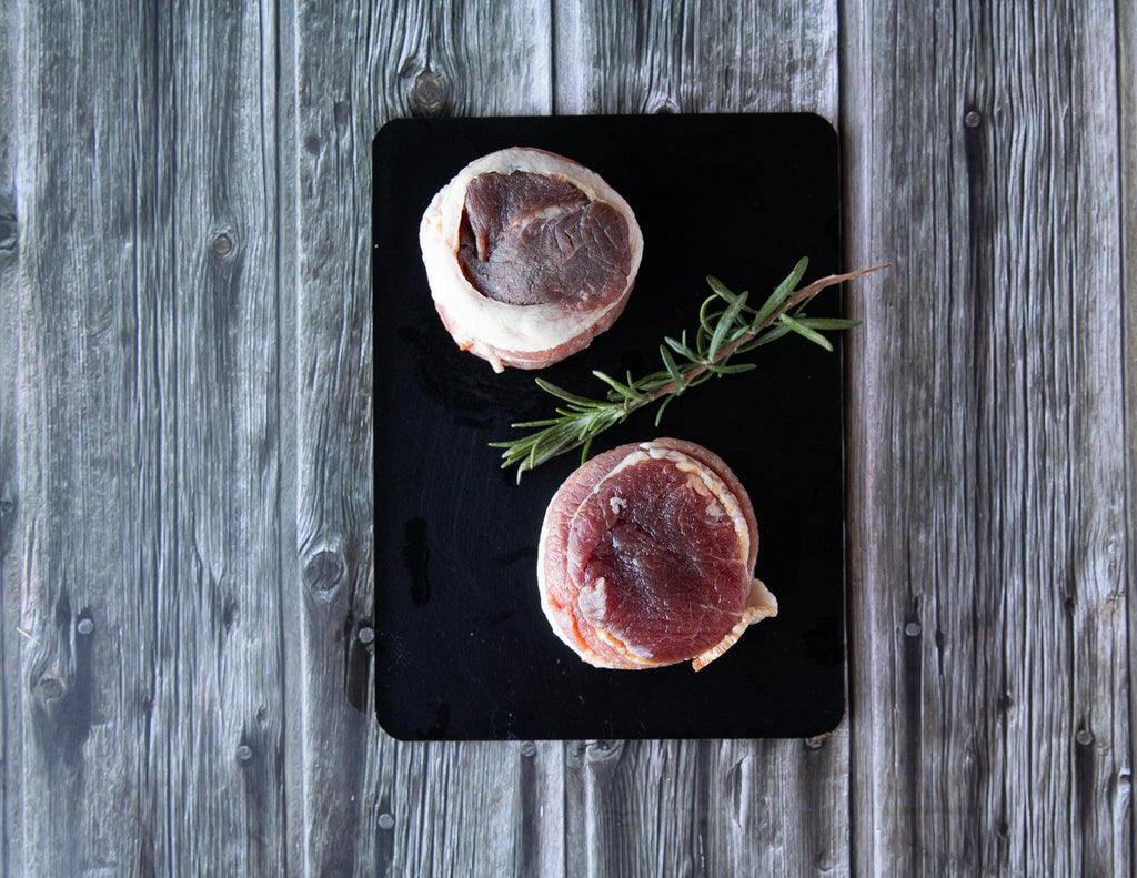 Raw 4oz Bacon Wrapped Tenderloin Steaks from Sealand Quality Foods.
