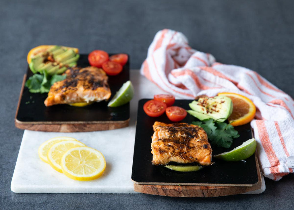 Sealand's Arctic Char Fillets with tomatoes, avocado, and a wedge of lime.