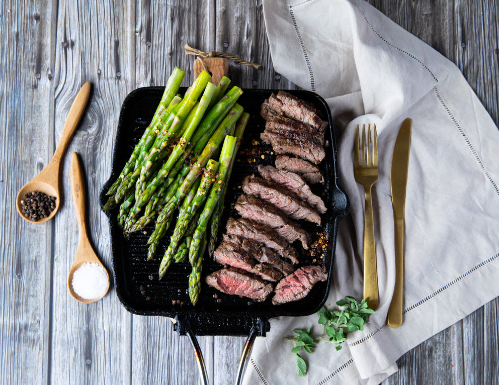 Sliced Sealand Bavette Steak Served with Asparagus