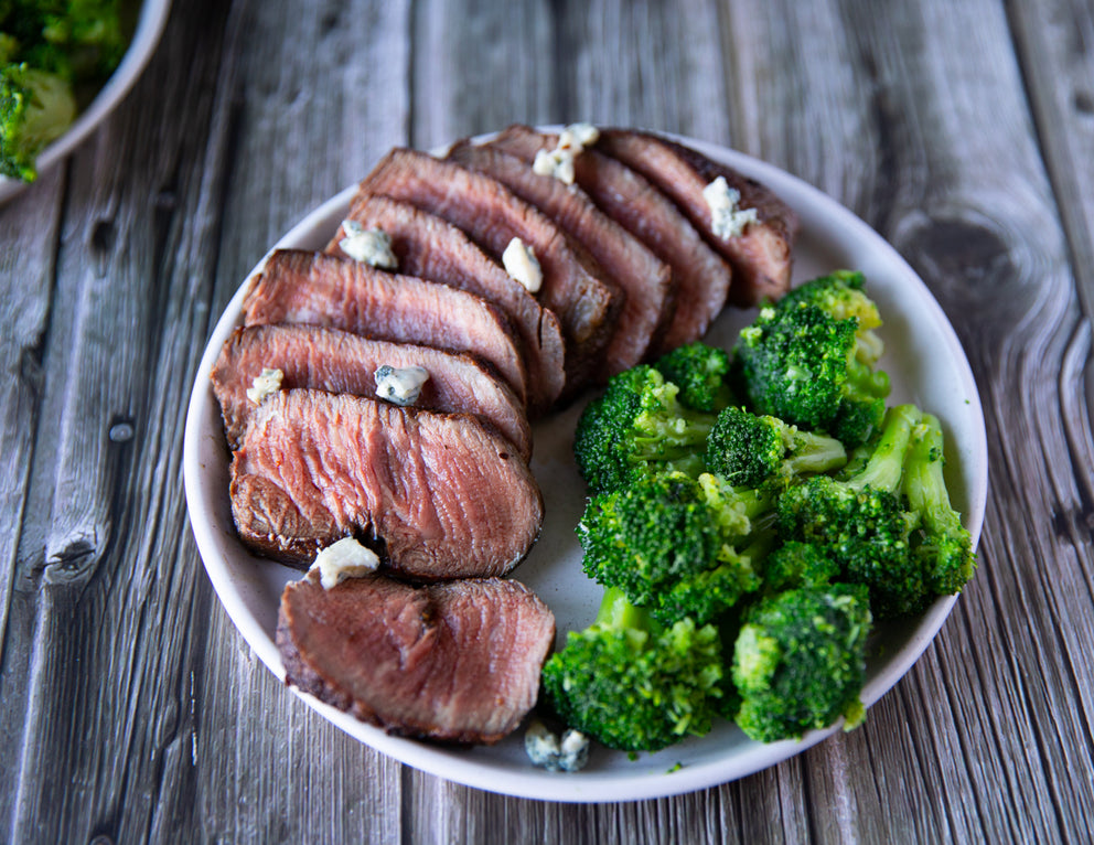 Sealand's 10oz Tenderloin Steaks Chateaubriand for Two Plated with Bleu Cheese and Broccoli