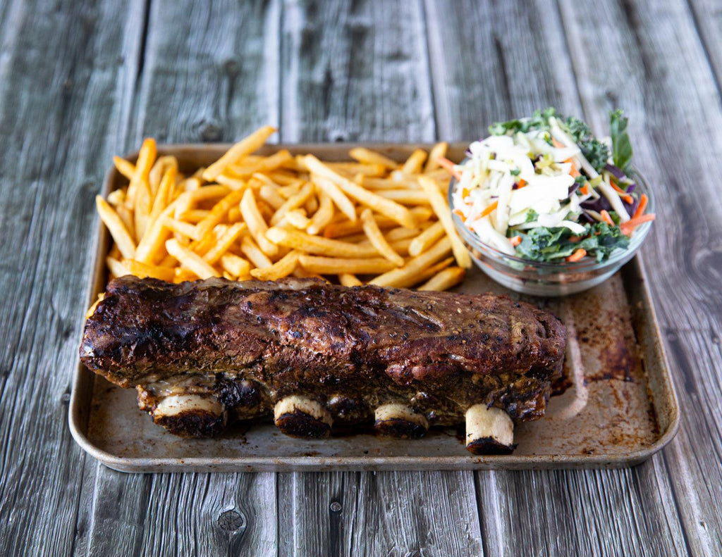 Sealand Quality Foods' Gluten-Free Beef Short Ribs with fries and coleslaw.