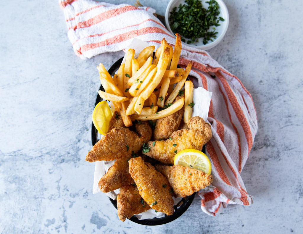 Sealand Quality Foods Gluten-Free Chicken Fingers in a Basket of Fries