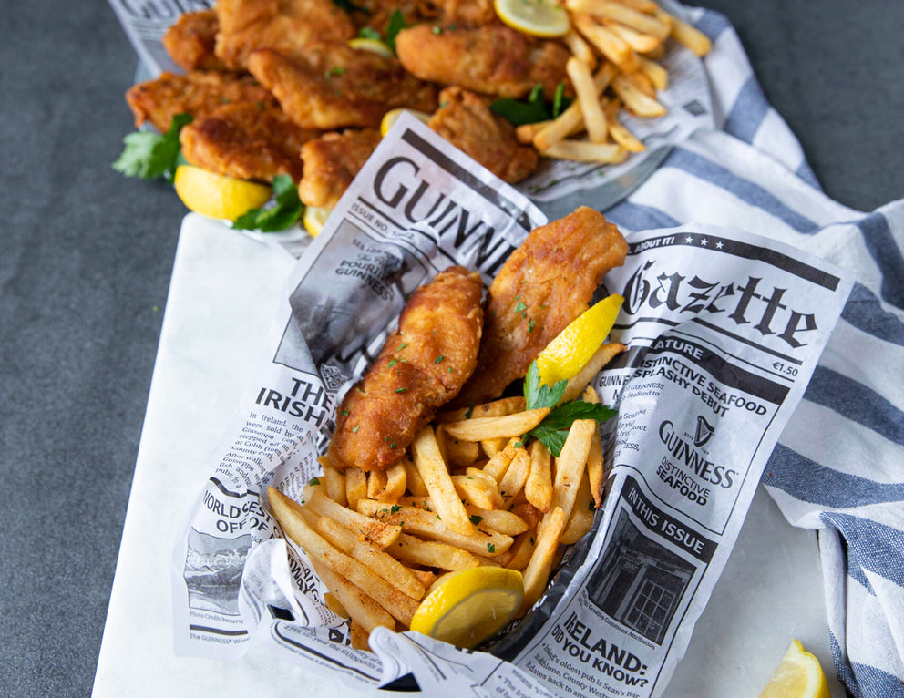 Newspaper Basket of Sealand's Guinness Battered Cod with Chips and Lemon