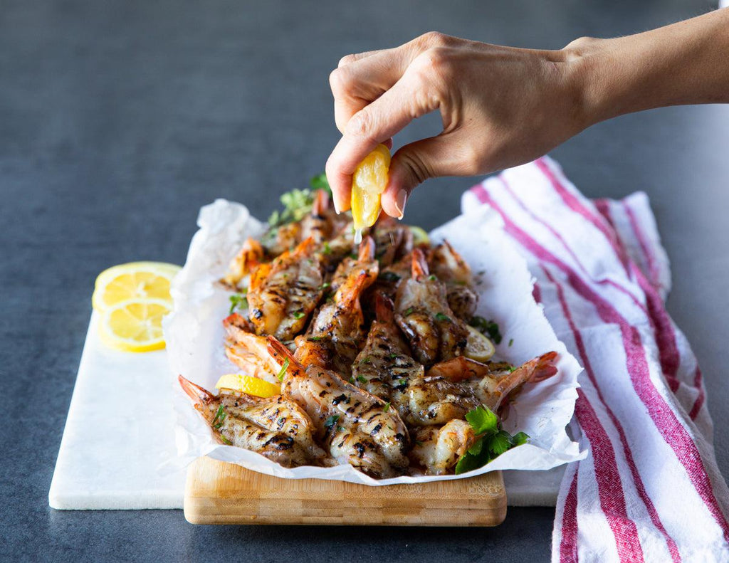 Sealand's Herb and Garlic Butterfly Shrimp with a squeeze of lemon.