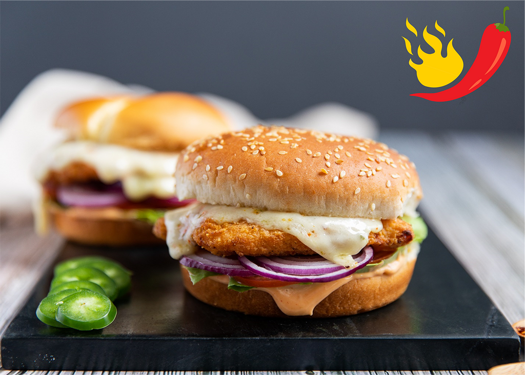 Hot and Spicy Chicken Breast Burgers with Melted Cheese and Jalapenos