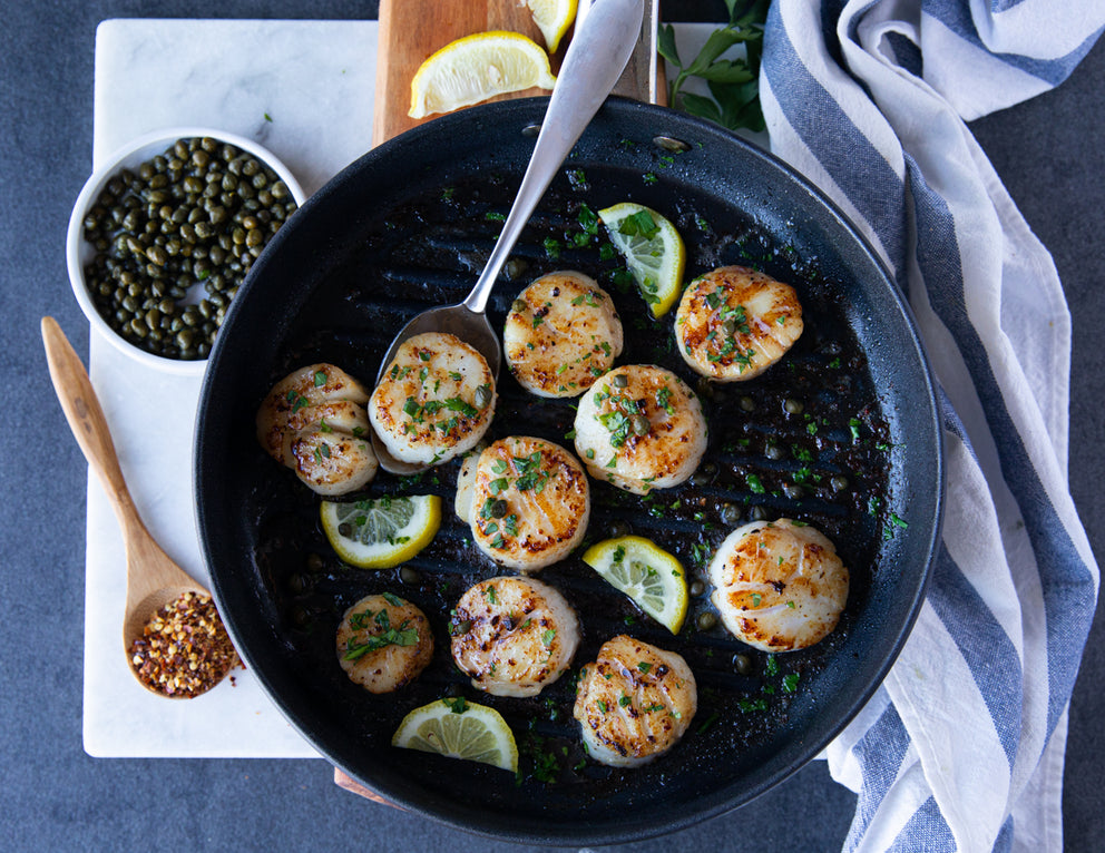 Sealand Quality Foods Natural Dry Scallops Seared in a Cast Iron Pan