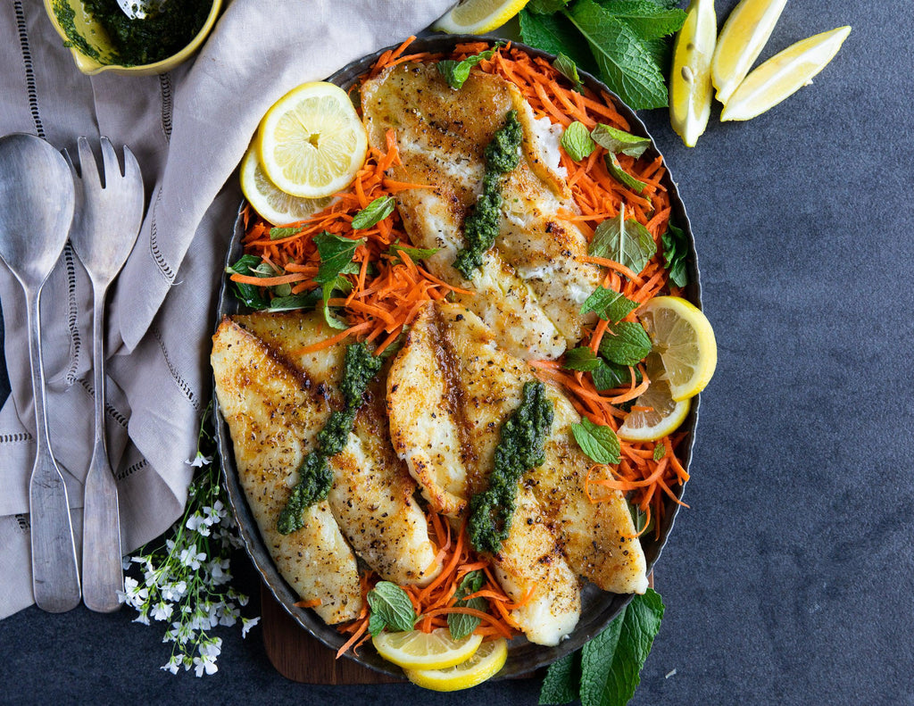 Sealand's Orange Roughy Fillets with fresh mint, shredded carrots, and topped with pesto.