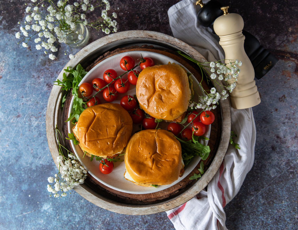 Canadian Peameal Breakfast Sandwiches on a brioche bun.