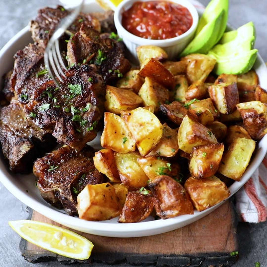 Sealand stove top lamb chops with roast potatoes, salsa and avocado