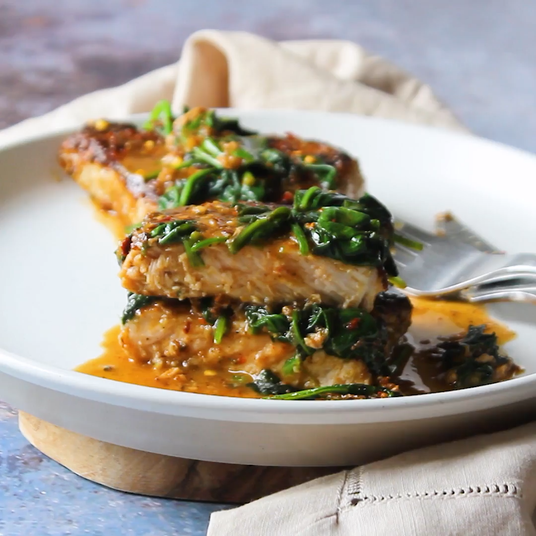Sealand Quality Foods Pan Seared Pork Steaks with Sauteed Spinach and Red Pepper Flakes