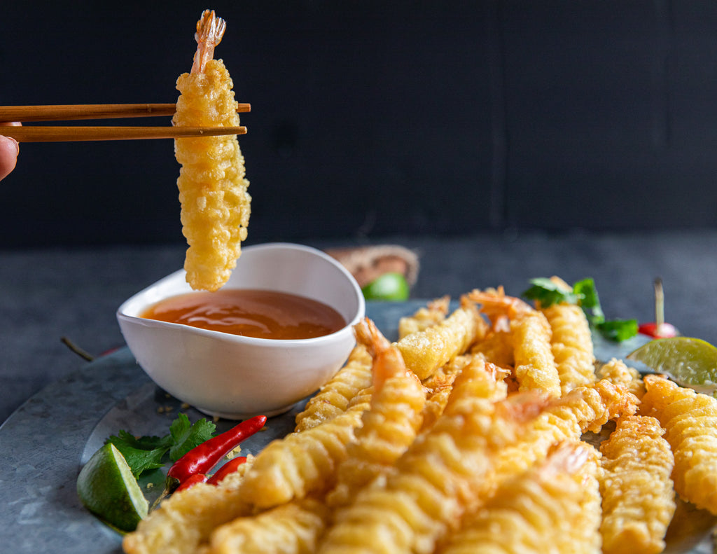 Cooked Shrimp Tempura with a spicy dipping sauce.