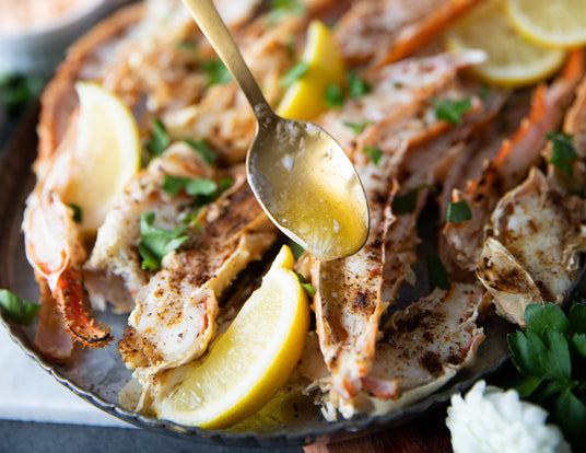 Sealand's Alaskan Split King Crab Legs Heated and Drizzled with Garlic Butter