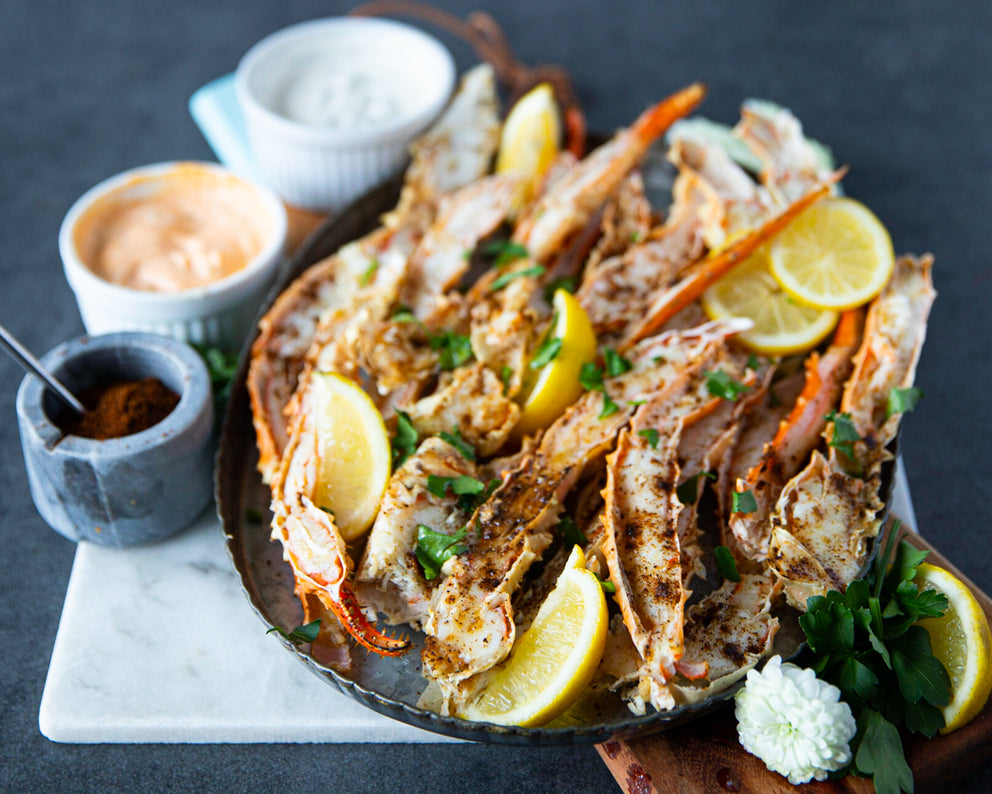 Cooked Platter of Sealand's Alaskan Split King Crab Legs Served with Lemon