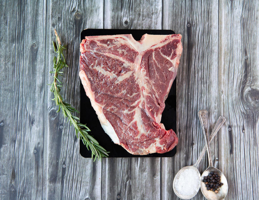 A raw T-Bone Steak from Sealand Quality Foods.