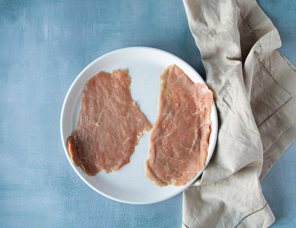 Raw Slices of Sealand Quality Foods Veal Scallopini