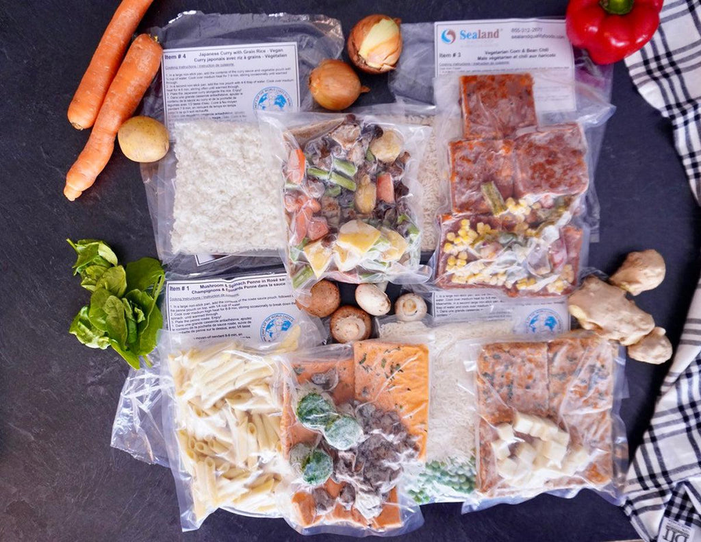 All four Vegetarian Ready in Minutes Meal Kits frozen in vacuum-sealed packaging.