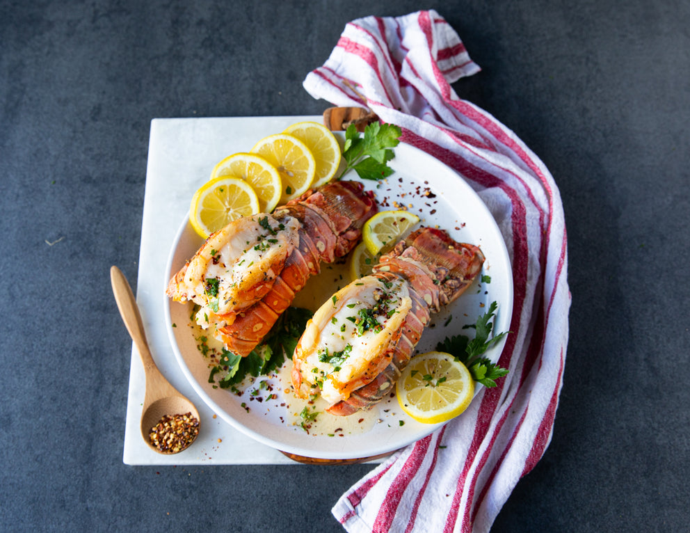 Two Sealand Quality Foods Lobster Tails Cooked and Sprinkled with Herbs