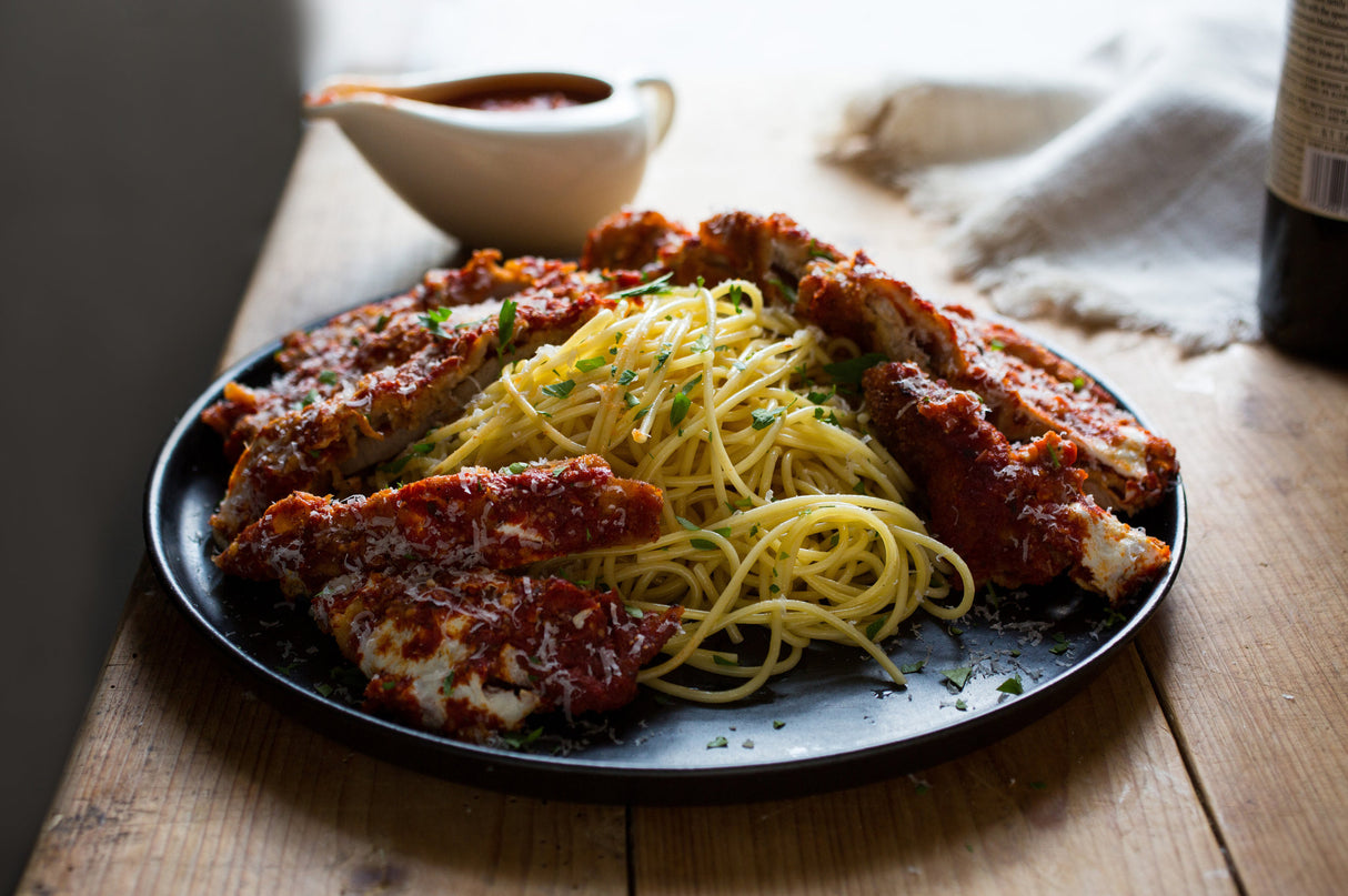 Breaded Veal Parmesan in Tomato Sauce